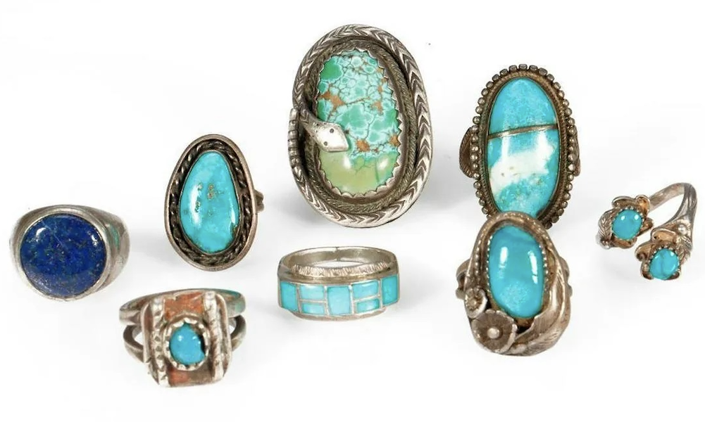 Group of eight silver and turquoise Navajo rings, estimated at $200-$300