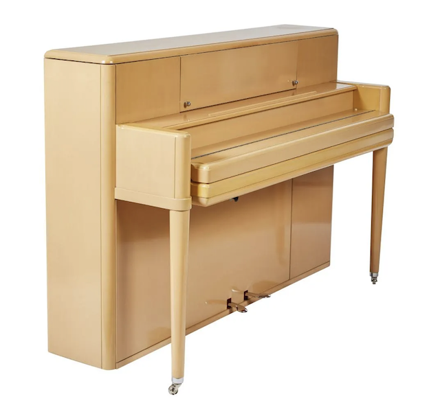 A 1950 Steinway Regency Model F upright piano in blonde walnut wood realized $7,500 plus the buyer’s premium in September 2018. Image courtesy of Billings and LiveAuctioneers