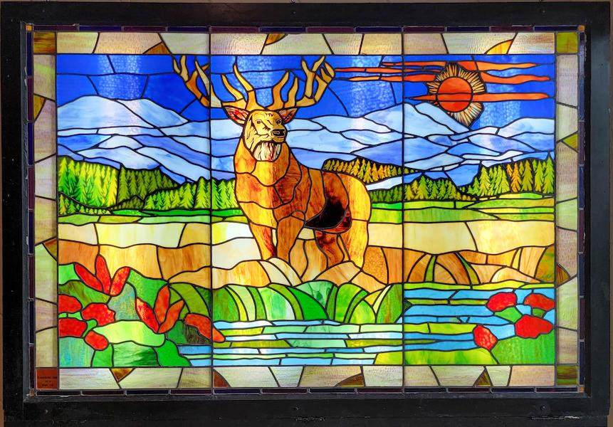 B.P.O.E. Elks commissioned stained glass window with back lighting and stand, estimated at $500-$1,000 