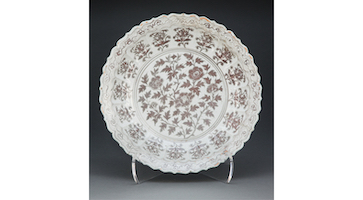 Peony-patterned Chinese dish, glazed with copper, est. $300,000-$500,000. Image courtesy of Heritage Auctions