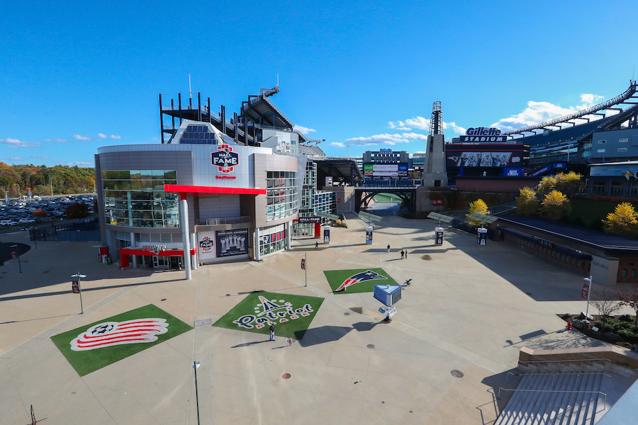 The Patriots Hall of Fame at Gillette Stadium in Foxborough, Mass., photographed in October 2019. On October 5, a fan who loaned a Tom Brady-signed American flag to the hall of fame sued the football team, claiming the manner in which it displayed the piece caused the signature to fade. Image courtesy of Wikimedia Commons, photo credit Patriot-place. Shared under the Creative Commons Attribution-Share Alike 4.0 International license.