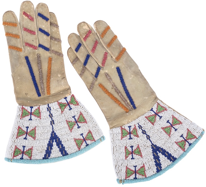 Pair of beaded and decorated gloves believed to have been owned by Buffalo Bill Cody, $1,560