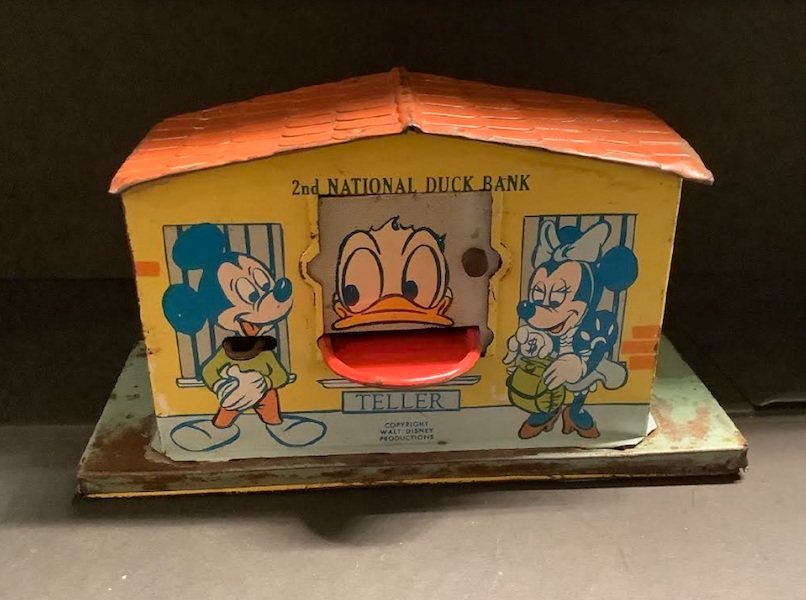 Circa-1950s Disney 2nd National Duck Bank mechanical tin bank, estimated at $500-$1,000