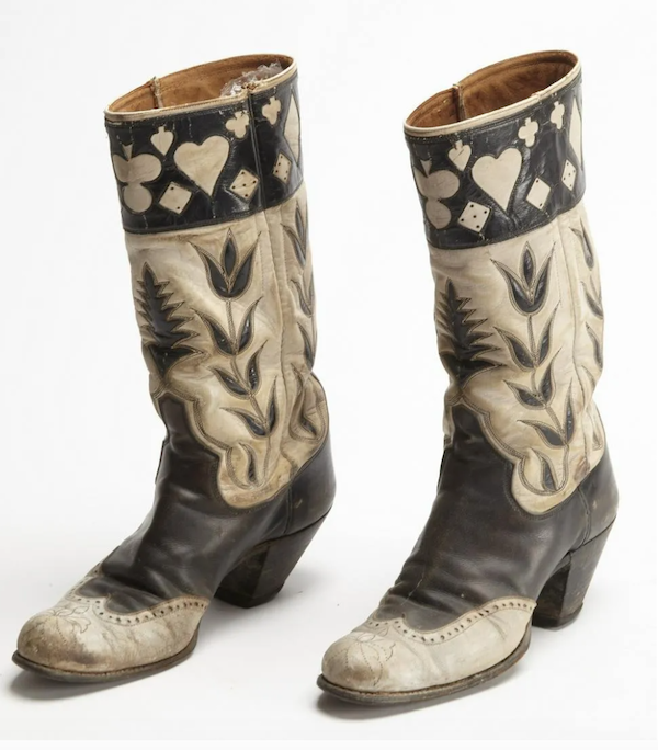 A pair of women’s cowboy boots decorated with gambling motifs sold for $450 plus the buyer’s premium in March 2020. Image courtesy of New England Auctions - Fred Giampietro and LiveAuctioneers.