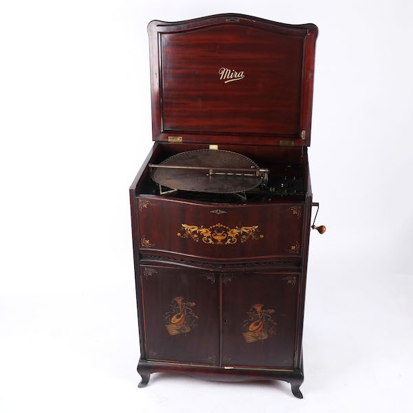 Mira mahogany disc player with 29 metal discs, estimated at $5,000-$7,000