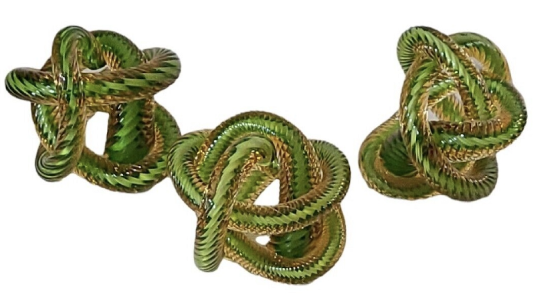  Group of three signed Oscar Zanetti Murano glass twisted rope knot sculptures, estimated at $1,000-$2,000