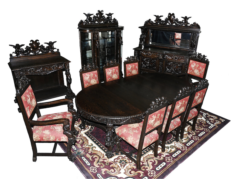 Highly detailed 12-piece dining set by R.J. Horner in the Oak Busted Lady pattern, estimated at $30,000-$60,000
