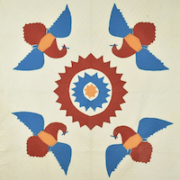 Detail of circa 1910-1920 red, white, blue and orange eagle-motif quilt, estimated at $1,000-$1,500