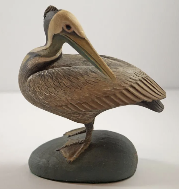 Miniature pelican wood carving by Frank Finney, estimated at $1,800-$2,000