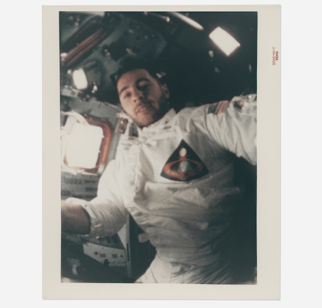 The first selfie in lunar orbit: William Anders during Intra Vehicular Activity inside the Apollo 8 Command Module orbiting the Moon, NASA, Apollo 8, December 21-27, 1968, estimated at $1,500-$2,500