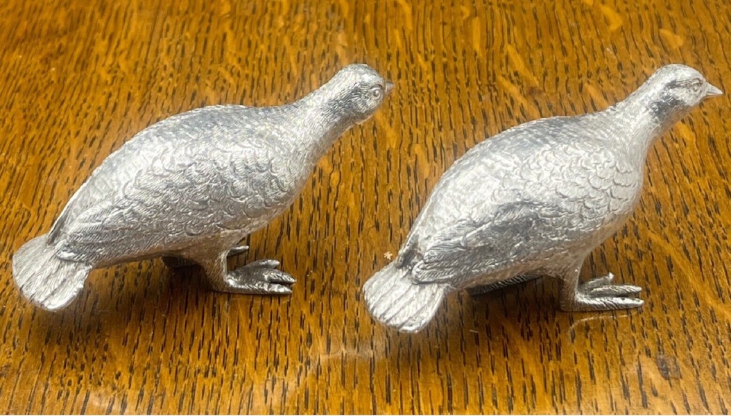 Pair of sterling silver grouse or pheasants by London silversmith Richard Comyns, estimated at $1,500-$2,500