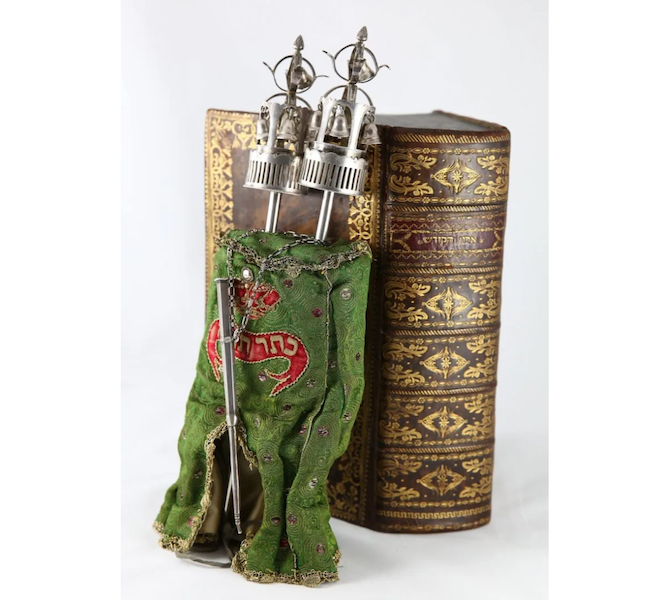 This miniature Sefer Torah, created for journeys, attained $65,000 plus the buyer’s premium in April 2016. Image courtesy of Winner’s Auctions LTD and LiveAuctioneers.