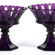 Pair of pressed Boston & Sandwich Glass Co. open-work amethyst fruit baskets, estimated at $3,000-$5,000