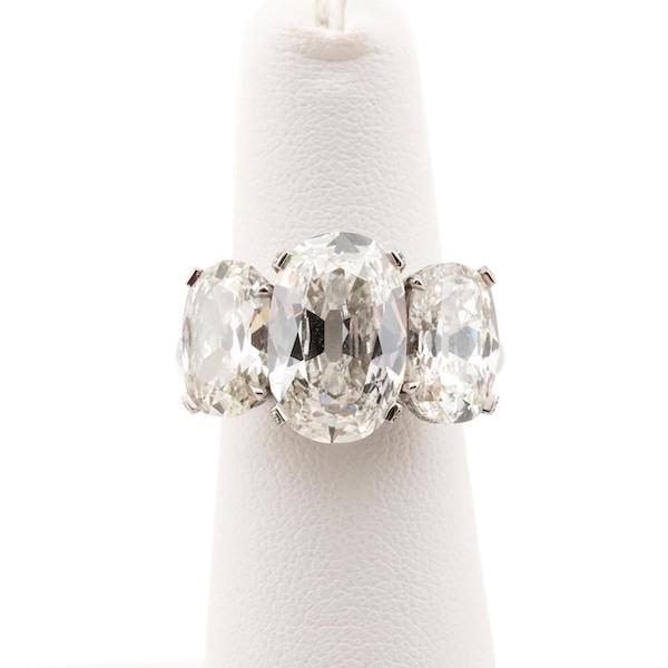  Three-stone platinum and 9.51-carat diamond ring, estimated at $125,000-$175,000