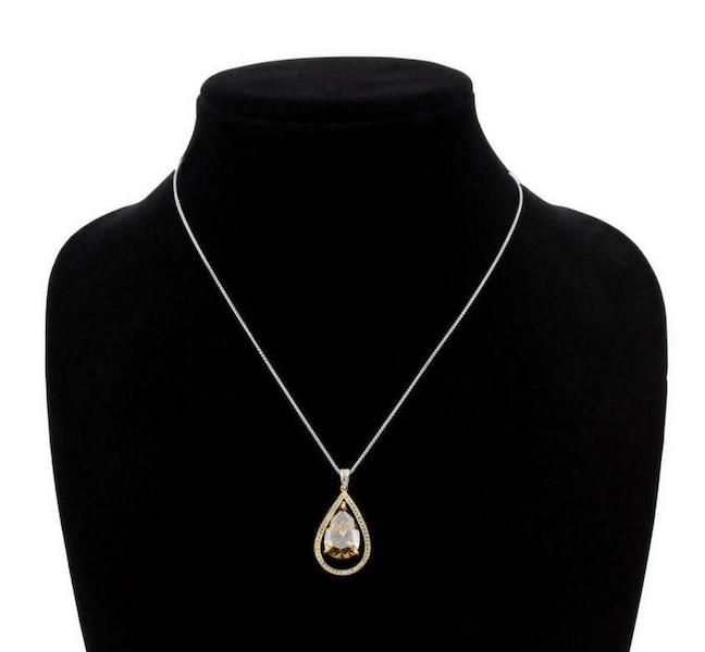 Neiman Marcus pendant with an 8.00-carat, pear-shape, brilliant cut cognac diamond, estimated at $65,000-$130,000