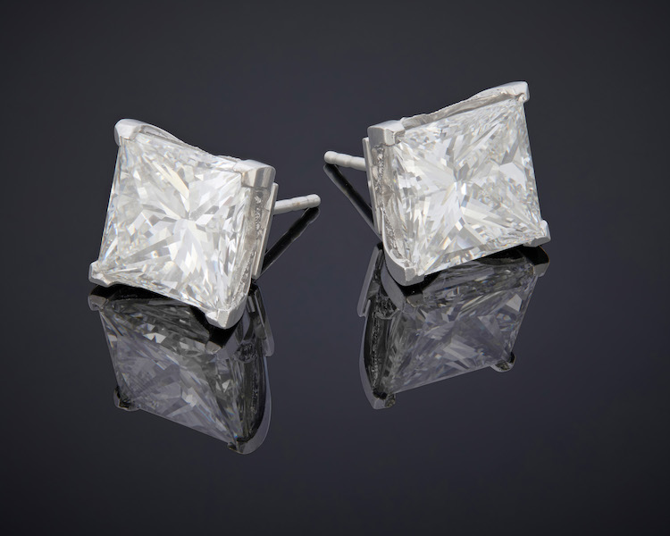 Princess-cut diamond and 14K white gold stud earrings previously belonging to Erika Jayne Girardi, estimated at $250,000-$350,000