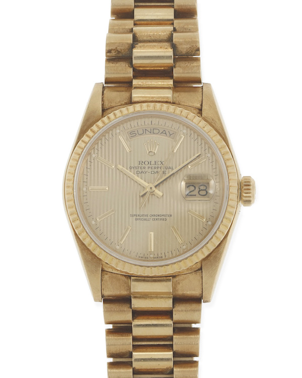 Circa-mid-1980s Rolex President watch with circular champagne tapestry dial, 18K gold case and bracelet, estimated at $10,000-$15,000