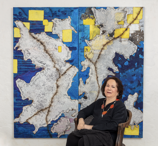 Mira Lehr pictured with her 2020 work ‘Norweky,’ created from burned and dyed Japanese paper, ignited fuses, ink, acrylic and handwriting on canvas, 72 by 72in. Collection of the Boca Raton Museum of Art. Photo credit Michael E. Fryd