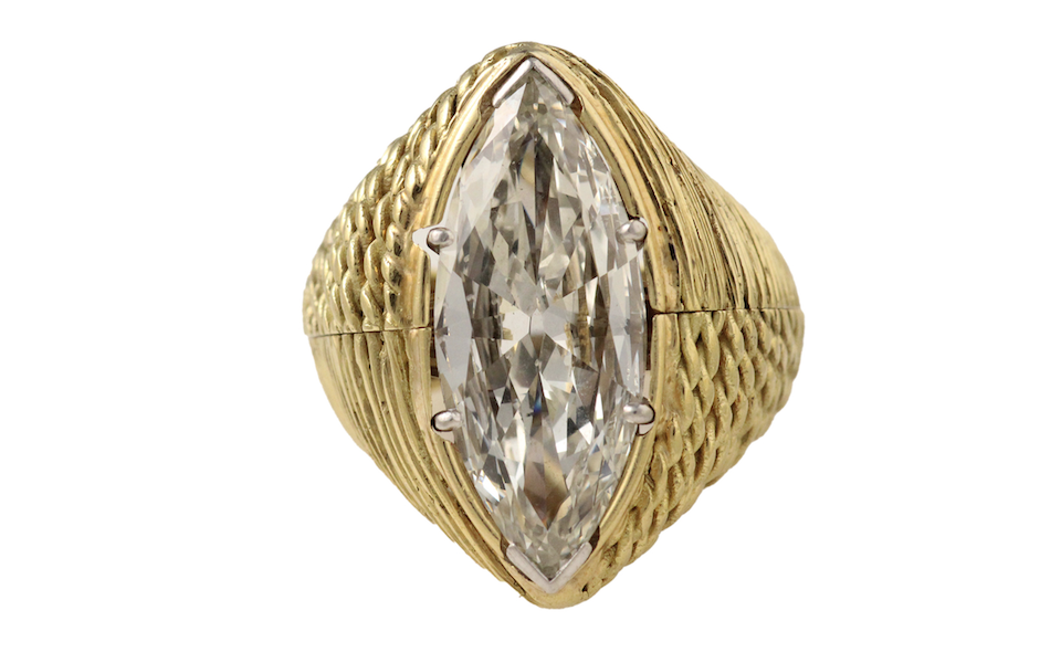 Marquis platinum and 6.1-carat diamond engagement ring with removeable gold cocktail jacket in a ribbed basket weave pattern, estimated at $50,000-$70,000