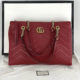 Gucci GG Marmont Azalea red leather shoulder bag, estimated at $2,500-$3,000