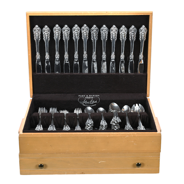 116-piece sterling silver flatware set by Wallace in the Grand Baroque pattern, estimated at $3,000-$4,500 