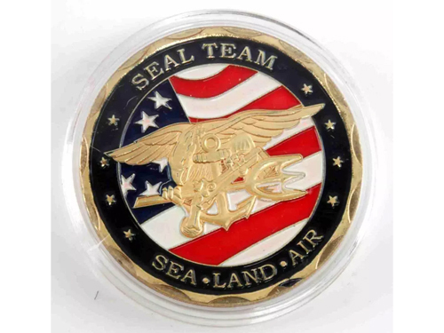 A cigar box containing more than 100 US Navy challenge coins, including the pictured Seal Team coin, made $230 plus the buyer’s premium in October 2018. Image courtesy of Affiliated Auctions and LiveAuctioneers.
