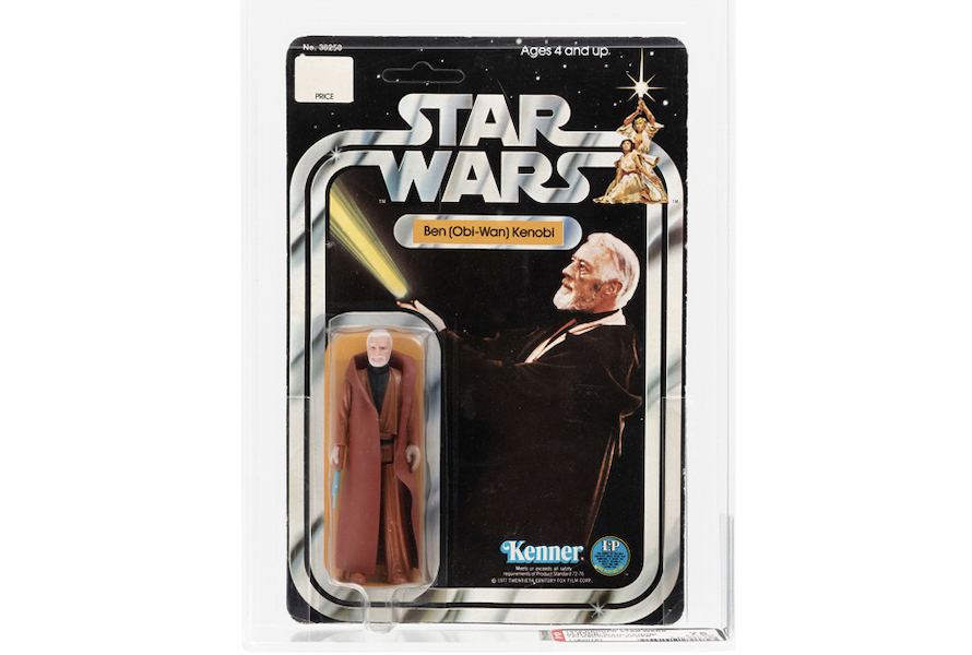 Encased Star Wars (1978) 3.75in Ben (Obi-Wan) Kenobi 12 Back-A double-telescoping lightsaber action figure with SKU on footer denoted earlier production, AFA 75 Ex+/NM. Extremely rare and only the third carded specimen of its type ever to be offered by Hake’s. Estimate $100,000-$200,000. Image courtesy of Hake’s Auctions