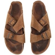 Brown suede Birkenstocks that belonged to the late tech entrepreneur Steve Jobs sold for $218,750 on November 13. Image courtesy of Julien’s Auctions
