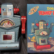 Original Yonezawa (Japan) 10in tin windup Diamond Planet Robot, rare variation with blue body and red arms, 100% original, with high-quality repro box. Sold within estimate for $33,210. Image courtesy of Milestone Auctions