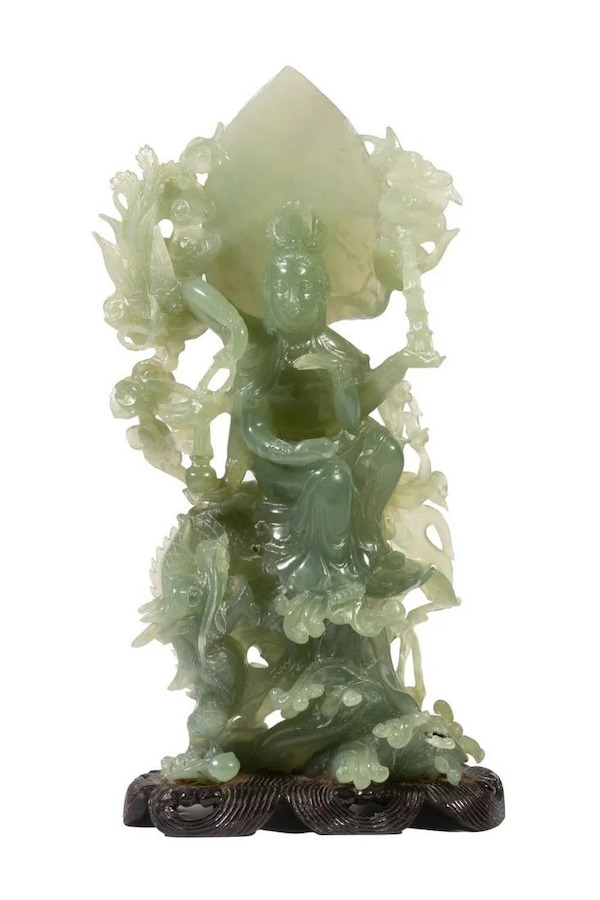 This large celadon jade figure of Vaudhara, the Buddhist bodhisattva of wealth, prosperity and abundance has a spade-shape halo. It brought $400 plus the buyer’s premium in November 2021. Image courtesy of Thomaston Place Auction Galleries and LiveAuctioneers