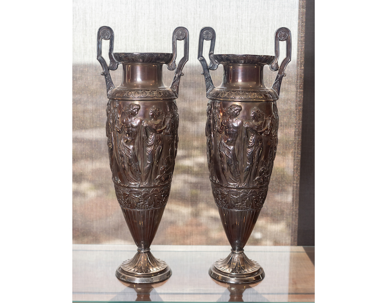 Pair of large silver urns by Odiot of Paris, estimated at $4,000-$6,000. Image courtesy of Abell Auction Co.