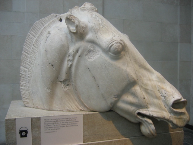 Part of the group of ancient Greek sculptures known as the Elgin Marbles, aka the Parthenon Sculptures, photographed on display at the British Museum in August 2006. On December 3, a Greek newspaper claimed that museum officials and the Greek prime minister had conducted secret talks regarding the possible return of the sculptures. Image courtesy of Wikimedia Commons, photo credit Urban. Shared under the Creative Commons Attribution-Share Alike 2.5 Generic license.