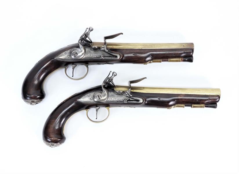 Pair of English silver and brass mounted flintlock pistols from around 1760, estimated at $3,000-$5,000