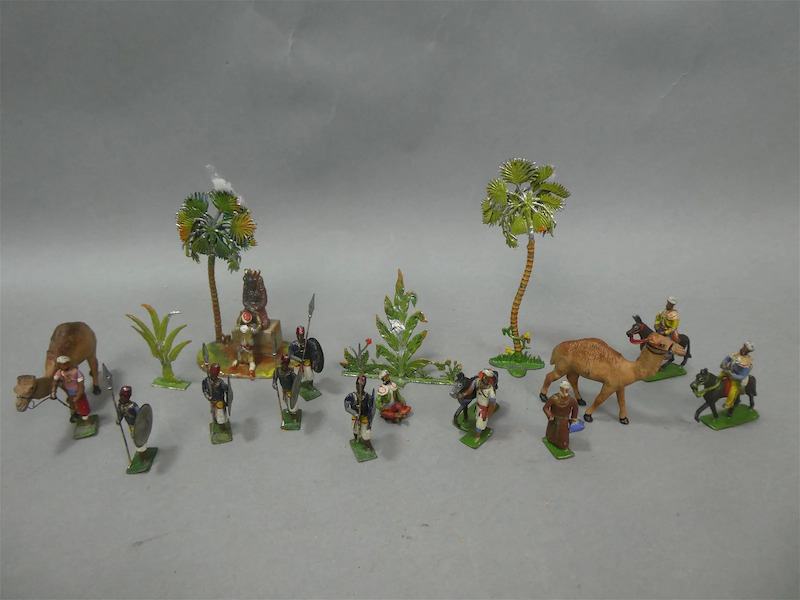 An unusual 16-piece set of 19th-century lead figures depicting Arabian soldiers, camels, and palm trees realized $2,000 plus the buyer’s premium in March 2022. Image courtesy of Lodestar Auctions and LiveAuctioneers