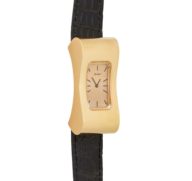Cartier exaggerated gold wristwatch, $20,000 