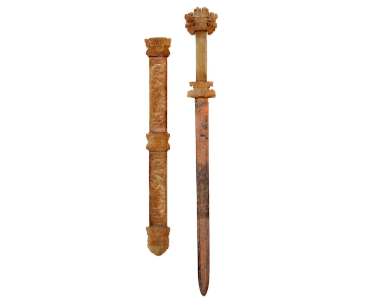 Archaic bronze sword with carved jade fittings, estimated at $20,000-$25,000