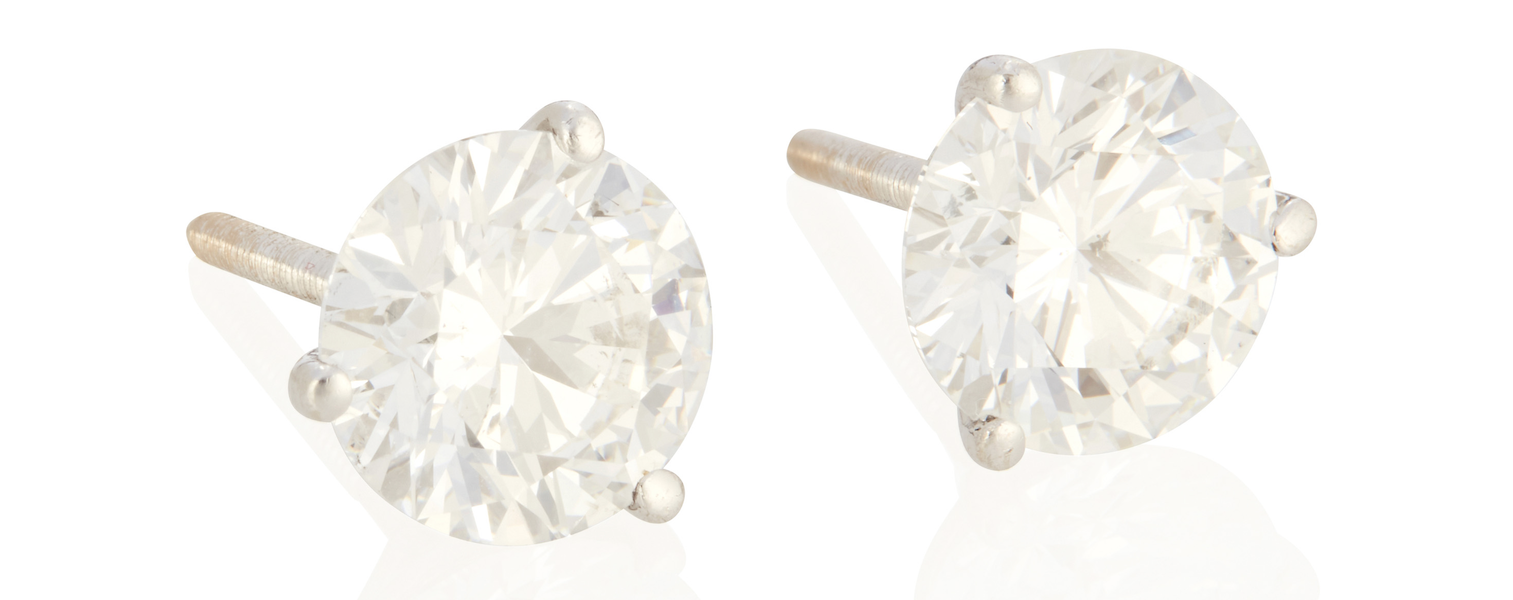 Pair of diamond stud earrings, $10,000