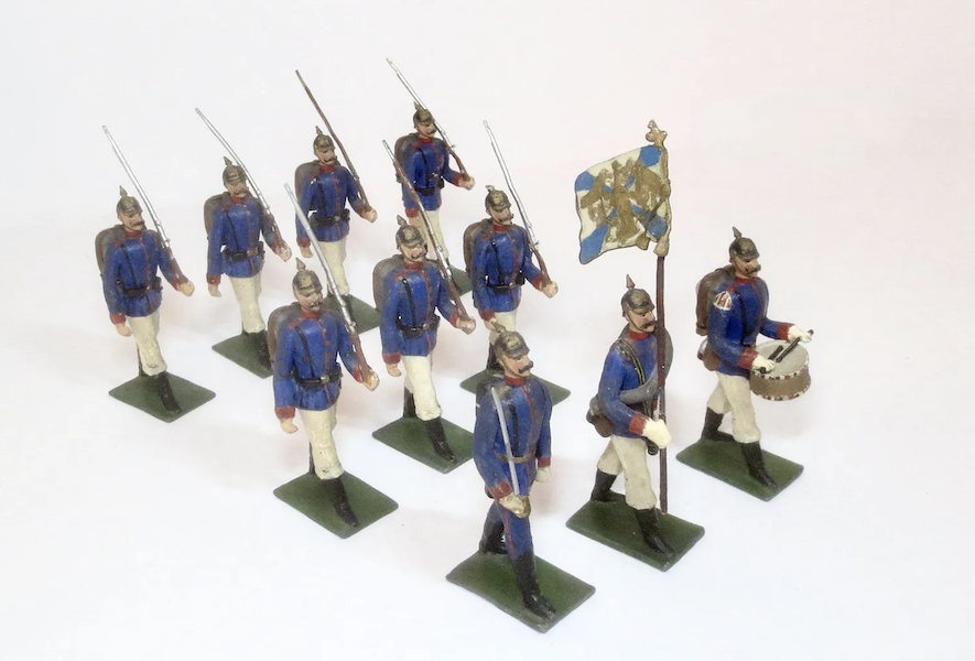 An unboxed 10-piece set of Heyde large-scale Prussian marching infantry toy soldiers achieved $6,500 plus the buyer’s premium in February 2022. Image courtesy of Old Toy Soldier Auctions USA and LiveAuctioneers