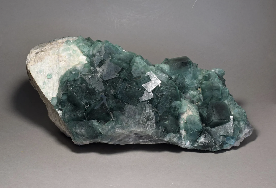 Deep green fluorite crystals on a matrix, estimated at $2,000-$2,500
