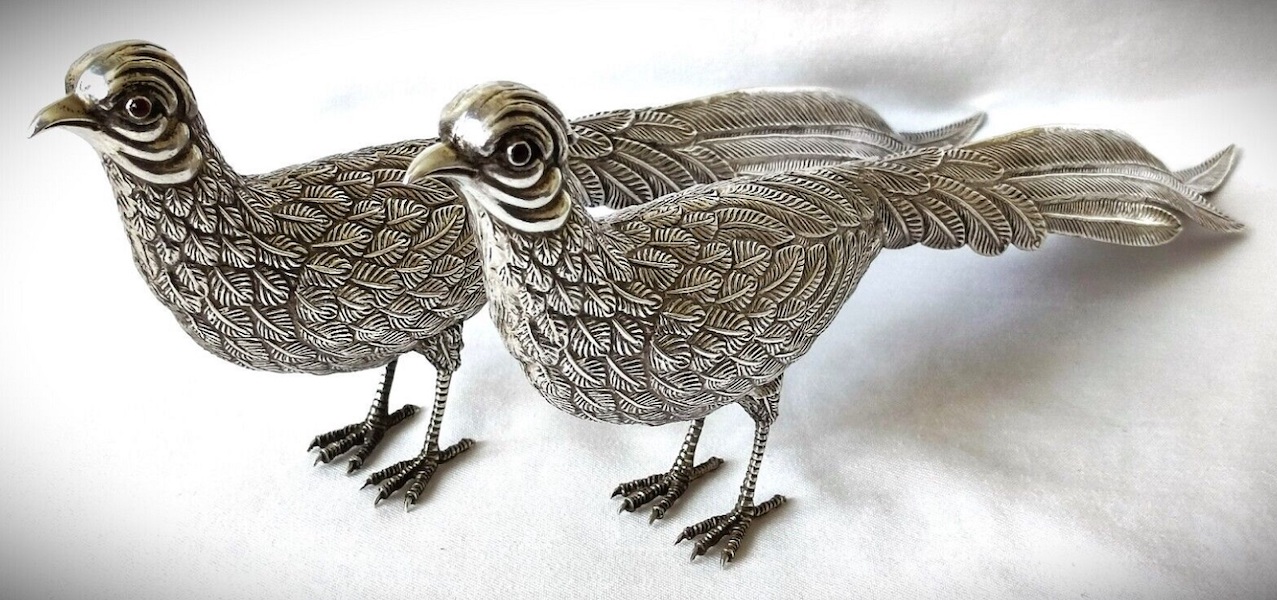 Pair of midcentury Spanish silver pheasant table sculptures, estimated at $1,000-$2,500
