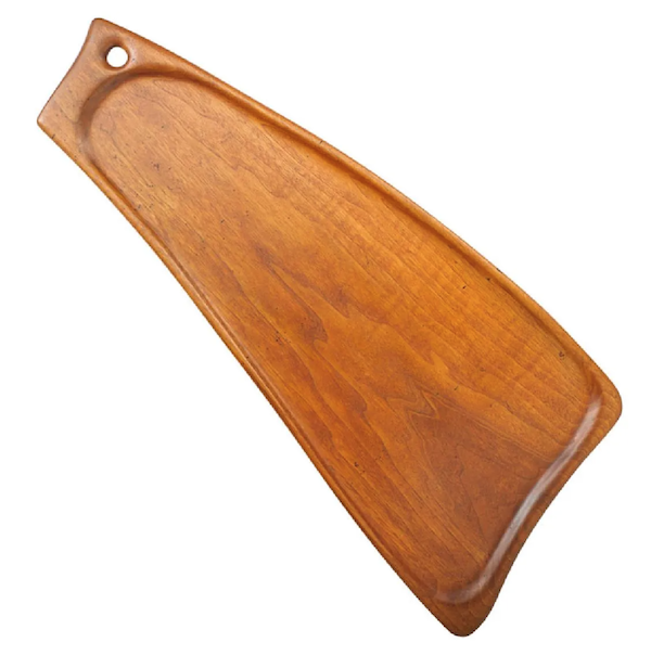 A Wharton Esherick-carved walnut serving tray earned $6,000 plus the buyer’s premium in January 2017. Image courtesy of Rago Arts and Auction Center and LiveAuctioneers.