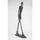 Alberto Giacometti, ‘Walking Man I,’ circa 1960, bronze, Fondation Giacometti. © Succession Alberto Giacometti / ADAGP, Paris, 2022