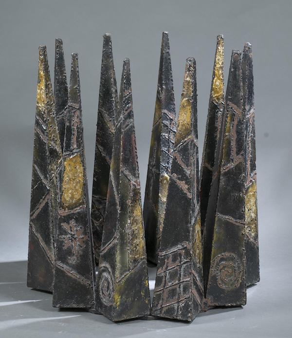 Circa-1965 Brutalist PE 46 table by Paul Evans (American, 1931-1987), made from wielded and patinated steel and featuring 10 spires that support a glass top. Estimate: $2,000-$3,000. Image courtesy of Quinn’s Auction Galleries