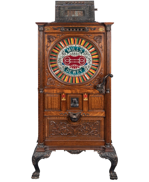 Mills 25 cent Dewey upright slot machine, estimated at $7,000-$9,000