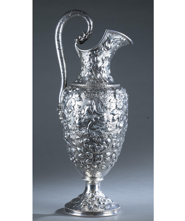 Kirk and Son (Baltimore) silver ewer, circa 1868-1890, with repousse floral decoration, serpent-head handle and central lion figure, 17¼in tall, 34.17ozt. Estimate: $1,000-$2,000. Image courtesy of Quinn’s Auction Galleries