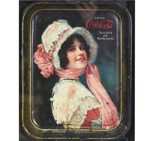 Rectangular Coca-Cola serving trays became standard as of 1910. This example, produced four years later and showcasing the Coca-Cola girl and the slogan ‘Delicious and Refreshing,’ brought $125 plus the buyer’s premium in April 2021. Image courtesy of Route 32 Auctions and LiveAuctioneers