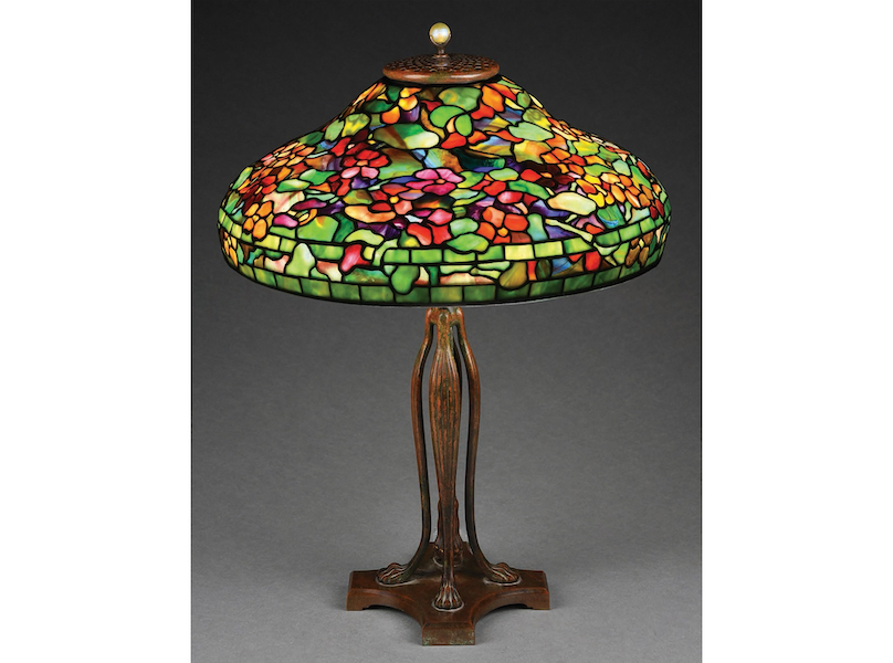 Tiffany Studios Nasturtium leaded-glass table lamp on telescoping cat’s-paw base. Sold within estimate for $123,000