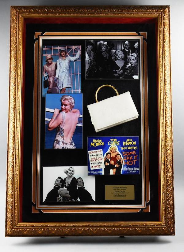 Shadowbox for the 1959 movie ‘Some Like It Hot,’ featuring stills from the film and a small purse signed by Marilyn Monroe, Tony Curtis and Jack Lemmon, estimated at $5,000-$1,000
