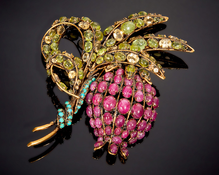 Iradj Moini pomegranate brooch, estimated at $500-$700 