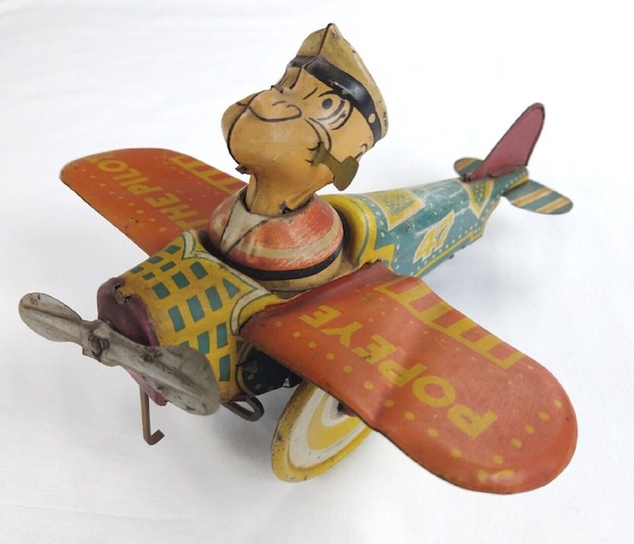 Circa-1930 Popeye the Pilot tin wind-up toy plane by Marx, estimated at $1,000-$1,500